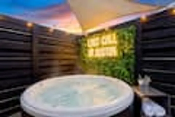 Six-person hot tub at sunset